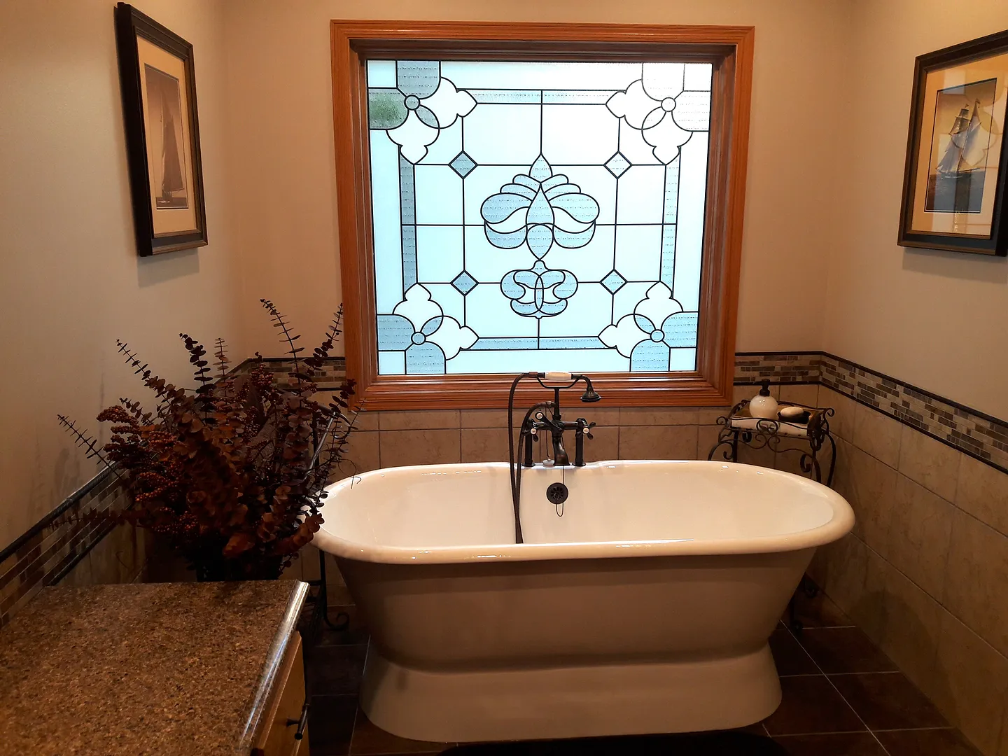 Elegant bathroom with clawfoot tub and SXEG-4864 White Palacia fleur-de-lis leaded glass window film